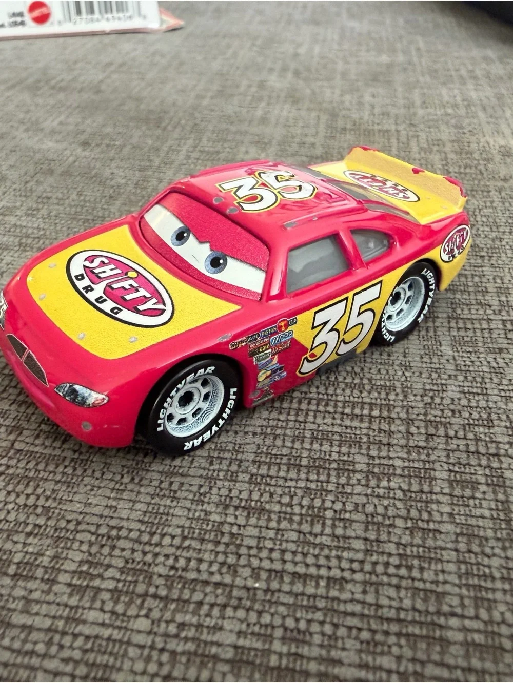 Cars Disney Pixar Mattel Kevin Racingtire - Red and Yellow Die-Cast Racecar